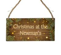 Transform Your Home into a Personalised Winter Wonderland with Our 'Christmas At The Surname' Hanging Plaque - Over 10 Design (Acrylic Indoor & Outdoor Use, Natural Wood Effect)