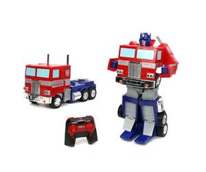 TRANSFORMERS Converting RC Optimus Prime - Original G1 model Remote Control Car - 30 cm long in Truck mode, standing 35 cm Tall converted to autobot mode with lights sounds and voice
