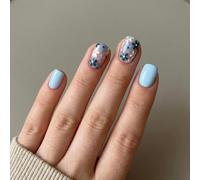 Trendy short square nails with pastel blue nail polish and chic floral accents, easy to apply press on for women, false art drill kit 24PCS