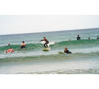 Two People: Surf Board and Wetsuit Day Hire with a Land Lesson