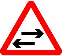 Two-way traffic crosses one-way road Road safety sign - 3mm Aluminium sign fitted with 2 strips Channel to rear for mounting on post 600mm x 600mm
