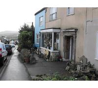 UK Photo Print A4 / 12"x8" A shop that sells Pots and trinkets Lyme Regis Here we look dow c2010
