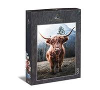 Ulmer Puzzleschmiede - Puzzle "Highland cattle" - 1000 pieces jigsaw puzzle - strong highland cattle in front of a cold alpine scenery