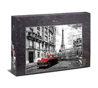 Ulmer Puzzleschmiede - Puzzle "Paris": 1000 pieces jigsaw puzzle - Nostalgic Paris motif in black and white with red car, Eiffel Tower in the background