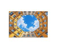 Unframe-Looking up at buildings from a courtyard Wall Art for Home Decor | A practical canvas print choice in an entrance space; it helps complete the room in compact or open spaces