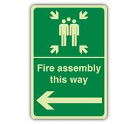 V Safety Glow In The Dark Fire Assembly This Way - Arrow Left Sign - 200 x 300 mm - Made From Double Glow Rigid Plastic - Fire Safety Signage - Made in Britain