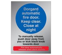 V Safety Photoluminescent Dorgard Automatic Fire Door - To Manually Release Push Door 150 x 200 mm - 3mm Brushed Aluminium Composite Safety Sign