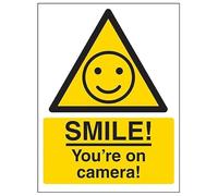 V Safety Warning - SMILE! You're On Camera! 150 x 200 mm - Self Adhesive Vinyl - Aluminium Effect Safety Sign