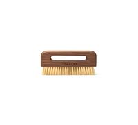 Vegan pocket-sized clothing brush from Steamery. Removes lint and fuzz.