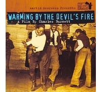 Warming By The Devils Fire