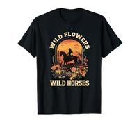 western sunset cowgirl riding horse wild flowers wild horses T-Shirt