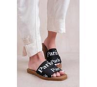 Where's That From Cobra Flat Sandals with Cross Over Band in Black Faux Leather Black