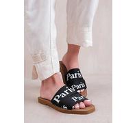 Where's That From Cobra Flat Sandals with Cross Over Band in Black Faux Leather Black