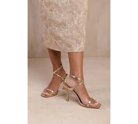 Where's That From 'flordia' Cross Over Strap Barely There High Heels In Gold