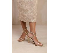 Where's That From Flordia Wide Fit Cross Over Strap Barely There High Heels in Gold Metallic Faux Leather - 6E - GOLD