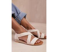 Where's That From 'hummingbird' Wide Fit Low Wedge Shoes With Cross Over Strap In Light Beige Light Beige 6