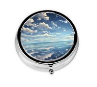 White Clouds Over The sea Round Mini Pill Box: 3-Compartment Portable Metal Pill Organizer with Snap Closure, Ideal for Daily Travel Use
