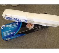 Wrapmaster 1000 Dispenser for Foil or Cling Film (30cm /12" Hand Held) by Wrap Film Systems