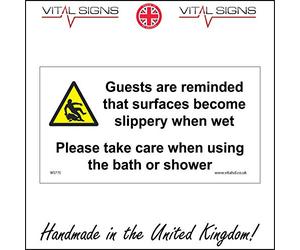 WS775 Warning Sign GUESTS ARE REMINDED THAT SURFACES BECOME SLIPPERY WHEN WET PLEASE TAKE CARE WHEN USING THE BATH OR SHOWER 200mm x 100mm 5MM HEAVY DUTY FOAMEX FOAMBOARD