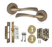 XFORT Solace Door Handle Lock Pack Includes Solace Lever on Rose Door Handles, 65mm Mortice Sashlock, Standard Escutcheons & 3 Hinges, Complete Internal Locking Handle & Key Set - Matt Antique Brass