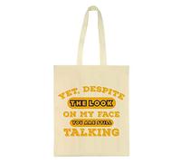 Yet Despite The Look on My face You're Still Talking Birthday Funny Rude Funny Joke Humorous Gift present Idea Tote Bag-Cotton Shopping Bag. (Natural)