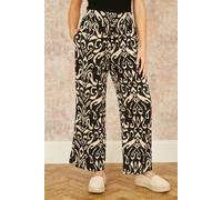 Yumi Women's Black Ikat Print Relaxed Fit Trousers | Size: 16